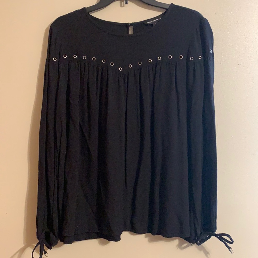 Rock & Republic Sz Large black long-sleeved top w/grommet detail on chest. EUC.